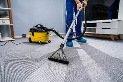 man cleans the dirty mat