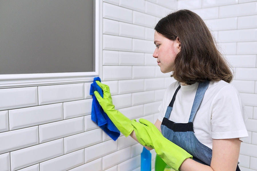 lady cleans the tiles
